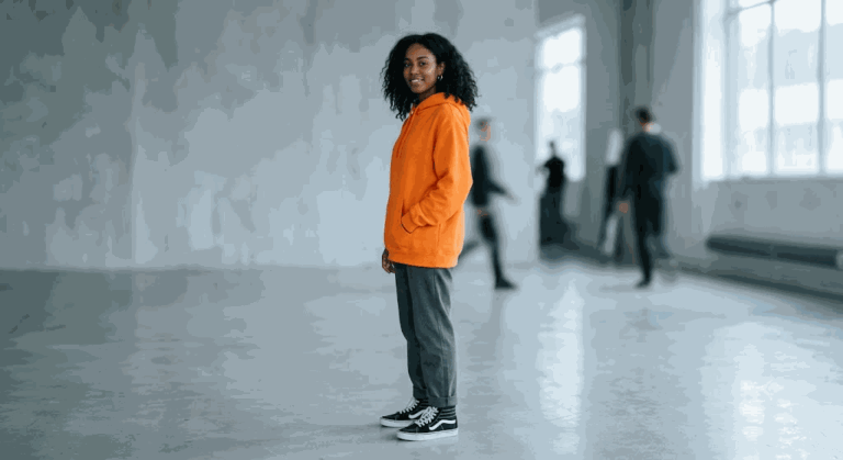 Промпт: fashion-портрет в студии, женщина в оранжевом худи, профиль, мягкий холодный свет