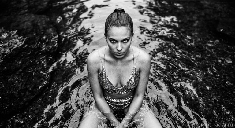 Промпт: Черно-белый фэшн-портрет женщины в воде, блестящий купальник, взгляд вверх